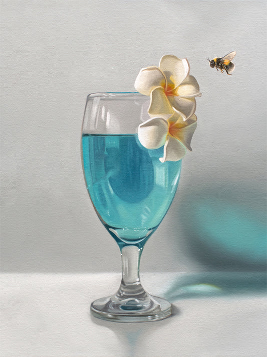 Blue Lagoon & Bumble Bee Fine Art Print by Lauren Pretorius: a curious bumble bee inspecting a pair of plumeria blossoms that rest upon a tropical blue lagoon cocktail.