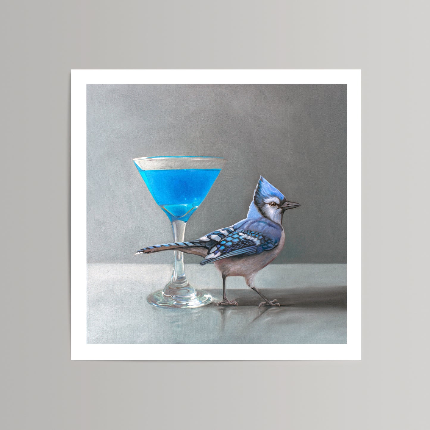 Vibrant blue jay and a blue martini in a glass, fine art print on cotton rag paper.