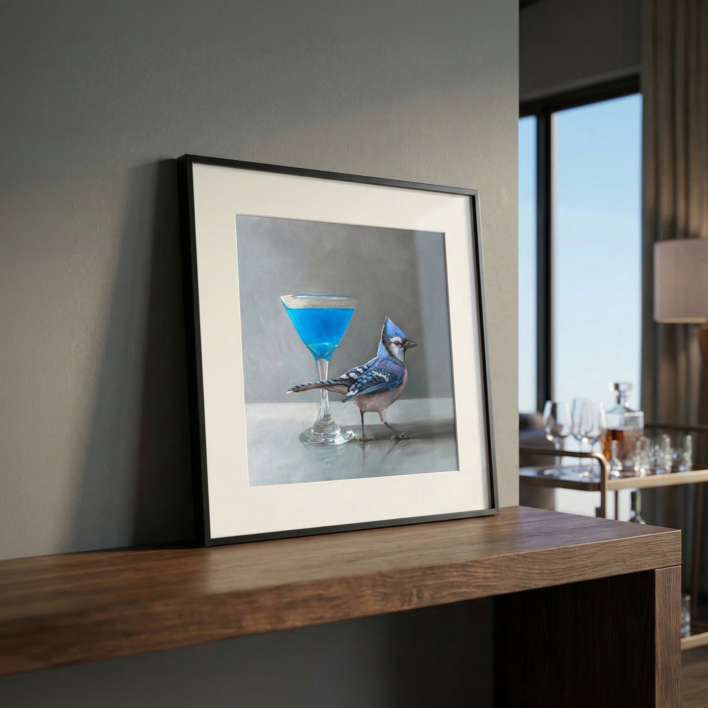 Framed fine art print of a blue jay standing next to a vibrant blue martini.