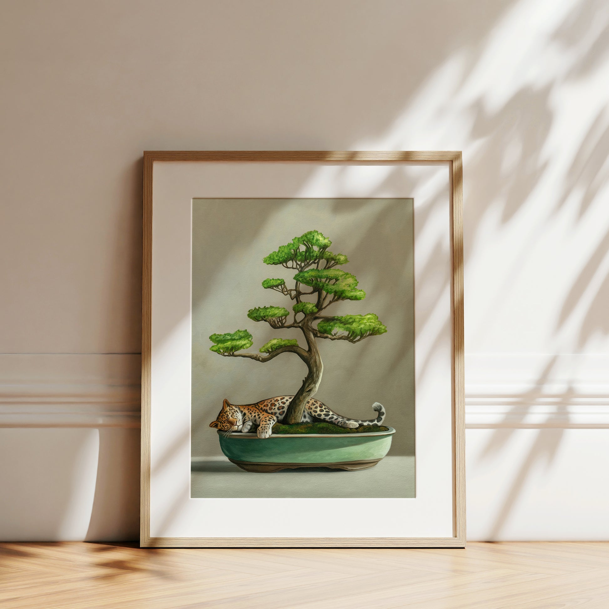Bonsai & Leopard Fine Art Print by Lauren Pretorius: a bonsai tree with green leaves and a mini leopard resting at the base.