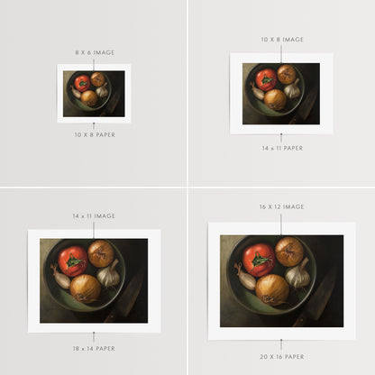 Bowl of Veggies Fine Art Print by Lauren Pretorius: a bowl of veggies from above containing a tomato, onions, garlic and a chefs knife in the shadow.