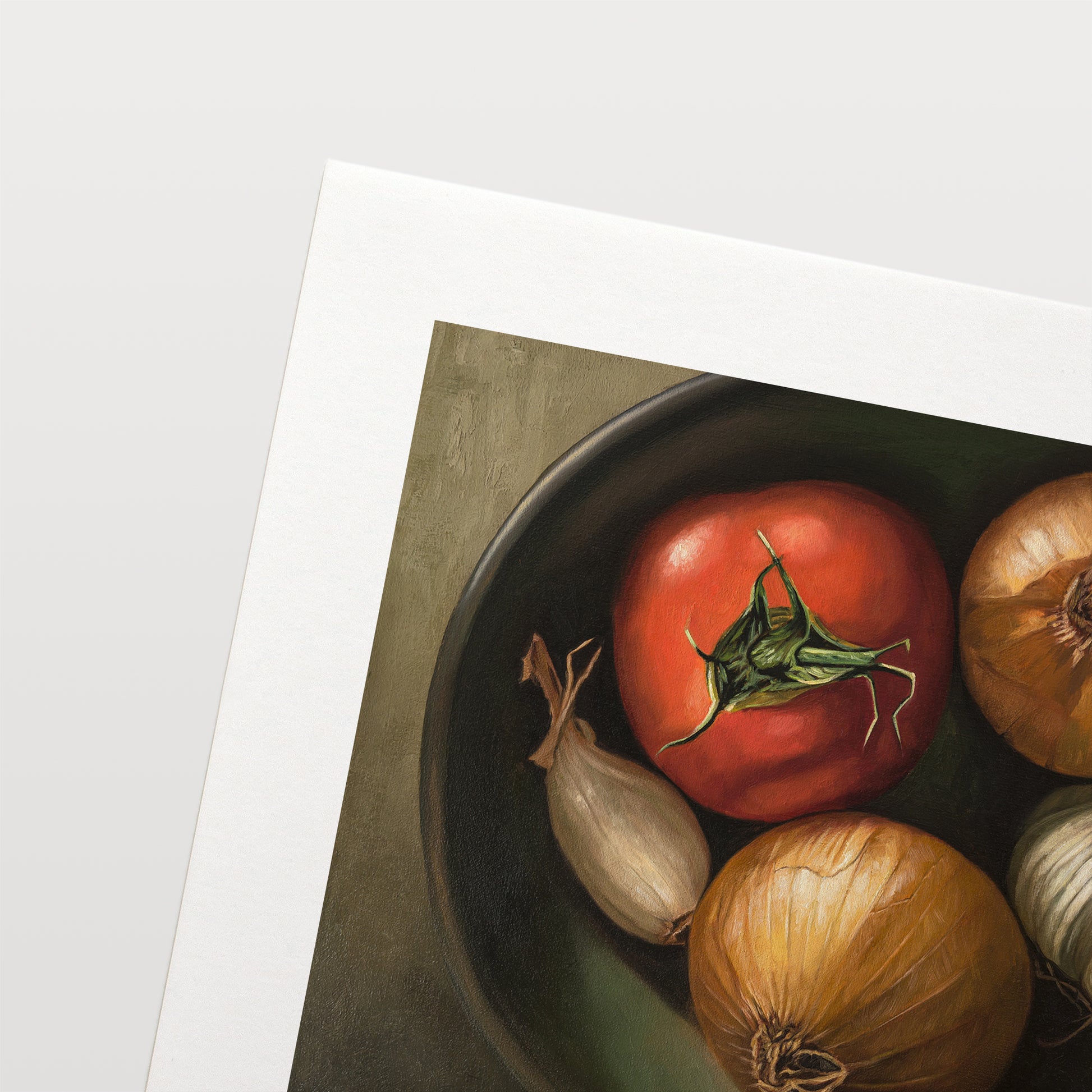 Bowl of Veggies Fine Art Print by Lauren Pretorius: a bowl of veggies from above containing a tomato, onions, garlic and a chefs knife in the shadow.