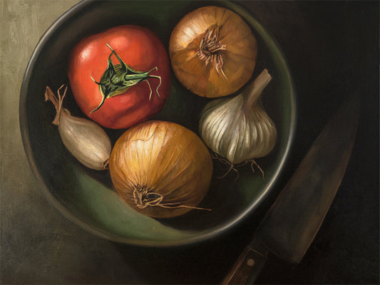 Bowl of Veggies Fine Art Print by Lauren Pretorius: a bowl of veggies from above containing a tomato, onions, garlic and a chefs knife in the shadow.