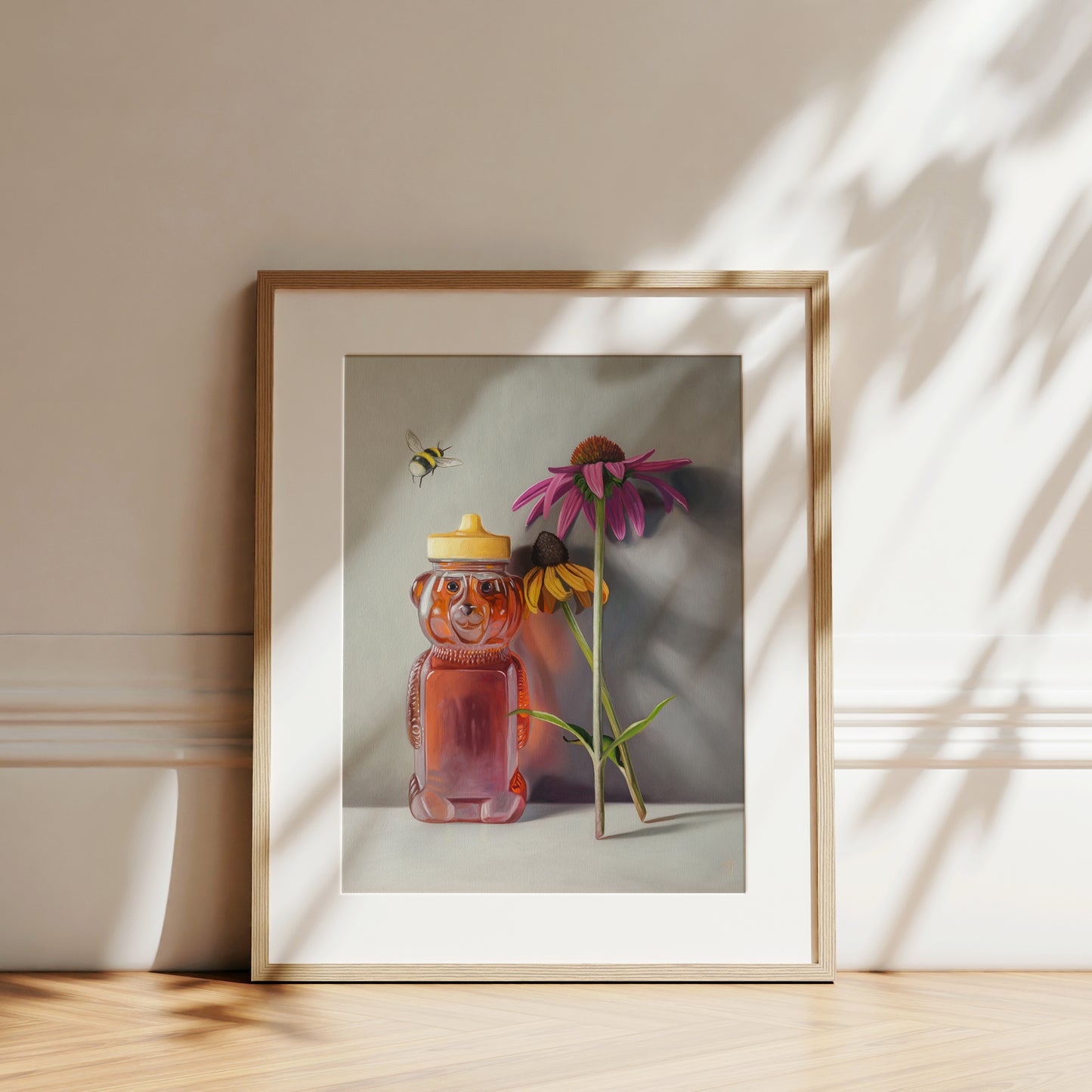 Bumble Bee, Honey & Blossoms Fine Art Print by Lauren Pretorius: a bottle of honey shaped as a bear and a pair of flowers with a bumble bee flying in to inspect.