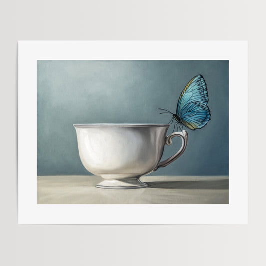 Butterfly & Teacup Fine Art Print by Lauren Pretorius: a butterfly drinking from a teacup, with a blue and white color scheme.