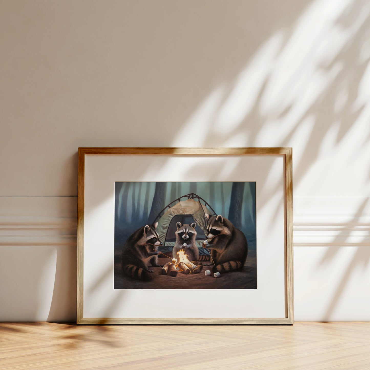 Campfire Raccoons Fine Art Print by Lauren Pretorius: a family of raccoons roasting marshmallows by a campfire in front of their tent in the woods at night.