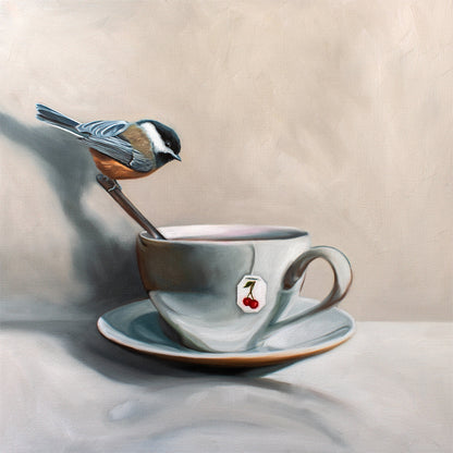 Fine art print of a chickadee perched on a spoon in a teacup with a cherry tea tag.