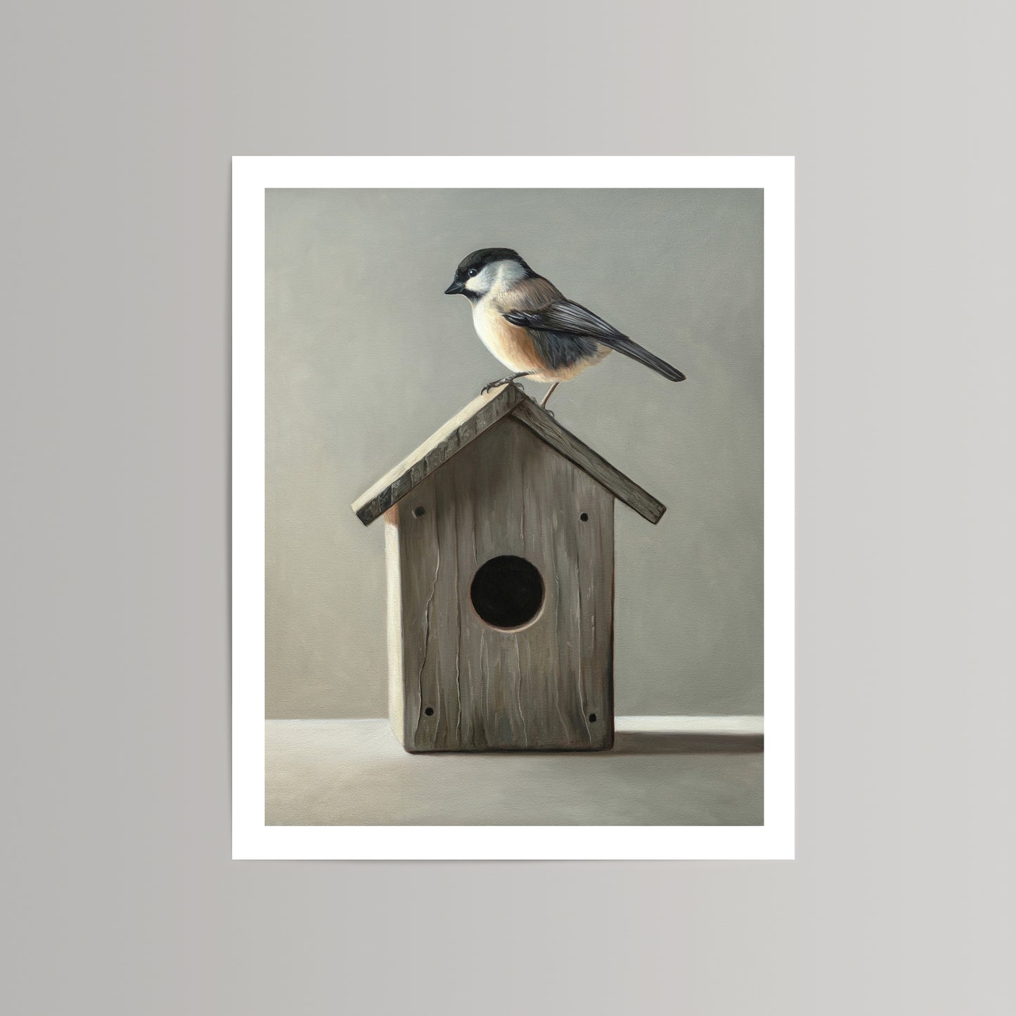 Fine art print of a black-capped chickadee perched on a rustic wooden birdhouse, on cotton rag paper.