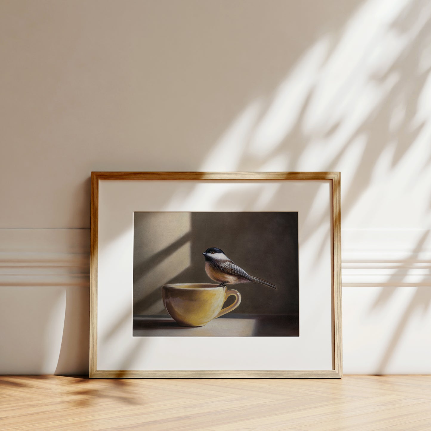 Chickadee & Yellow Cup Fine Art Print by Lauren Pretorius: a chickadee perched on the edge of a yellow cup.