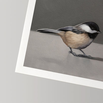 Fine art print of a black-capped chickadee on museum-grade cotton rag paper with a white border.