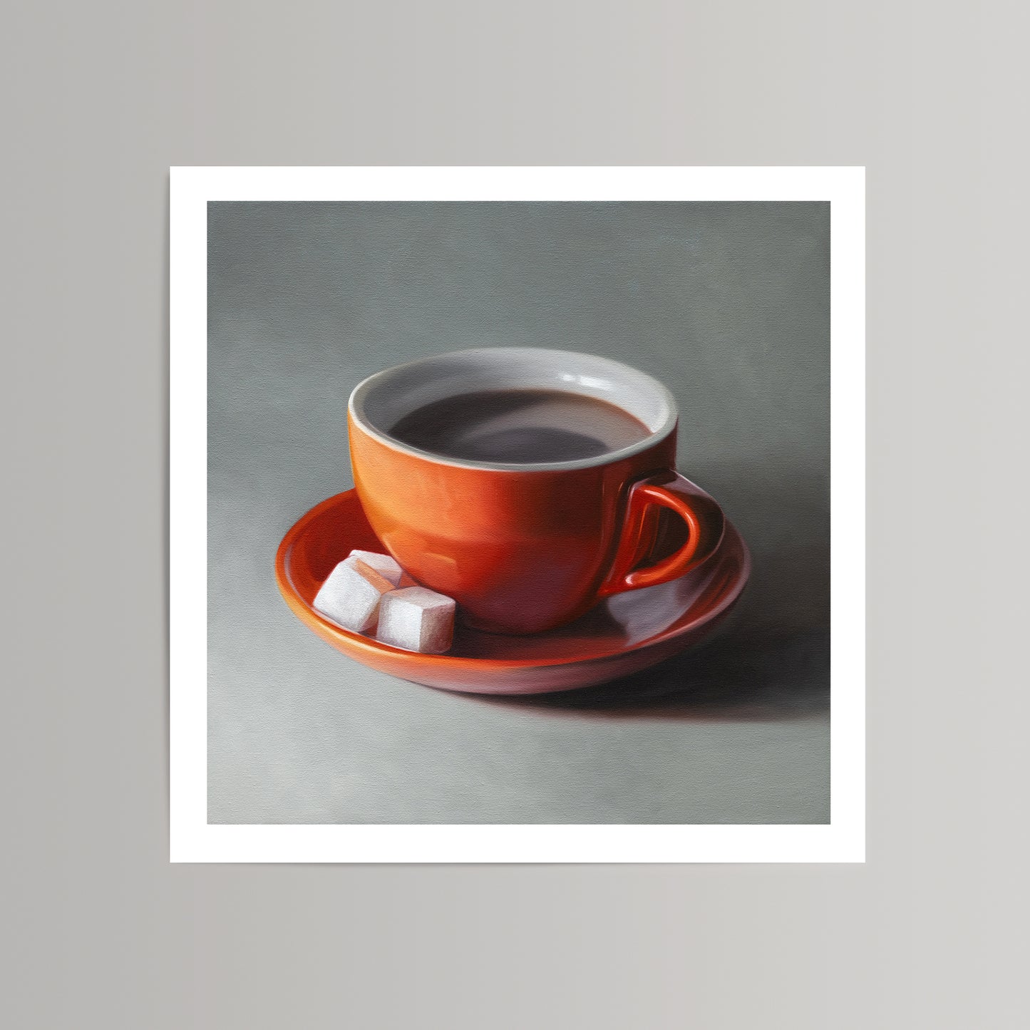 Fine art print of a vibrant orange coffee cup with dark coffee and two white sugar cubes on a saucer.
