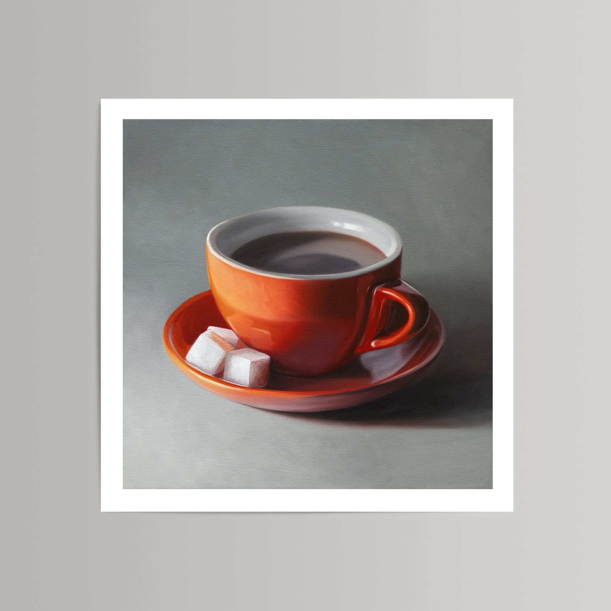 Fine art print of a vibrant orange coffee cup with dark coffee and two white sugar cubes on a saucer.