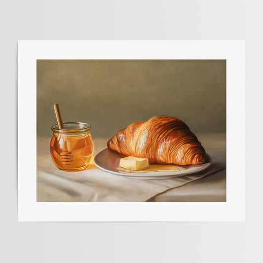Croissant, Honey & Butter Fine Art Print by Lauren Pretorius: a croissant with honey and butter on a plate.