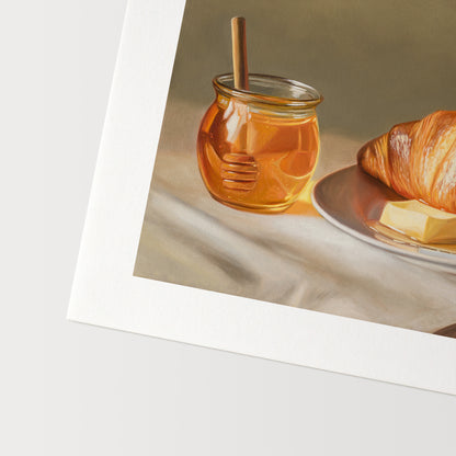 Croissant, Honey & Butter Fine Art Print by Lauren Pretorius: a croissant with honey and butter on a plate.