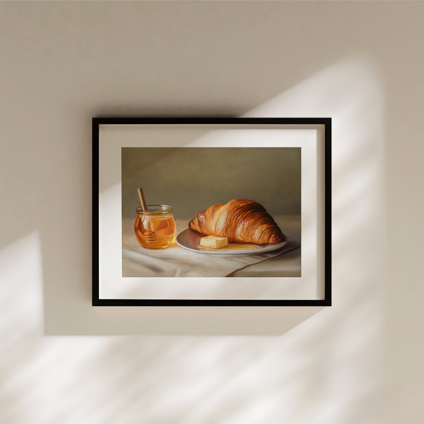 Croissant, Honey & Butter Fine Art Print by Lauren Pretorius: a croissant with honey and butter on a plate.