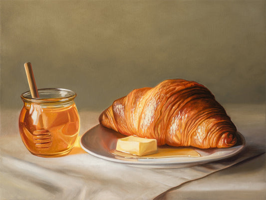 Croissant, Honey & Butter Fine Art Print by Lauren Pretorius: a croissant with honey and butter on a plate.