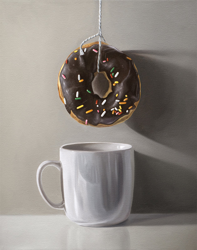 Fine art print of a chocolate donut with sprinkles hanging above a white coffee mug.