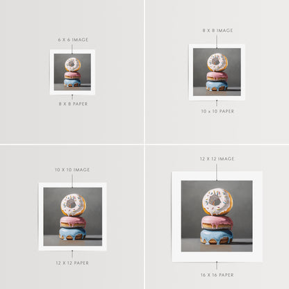 Donut Stack Trio Fine Art Print by Lauren Pretorius: a trio of donuts with different colored frosting stacked top of each other.
