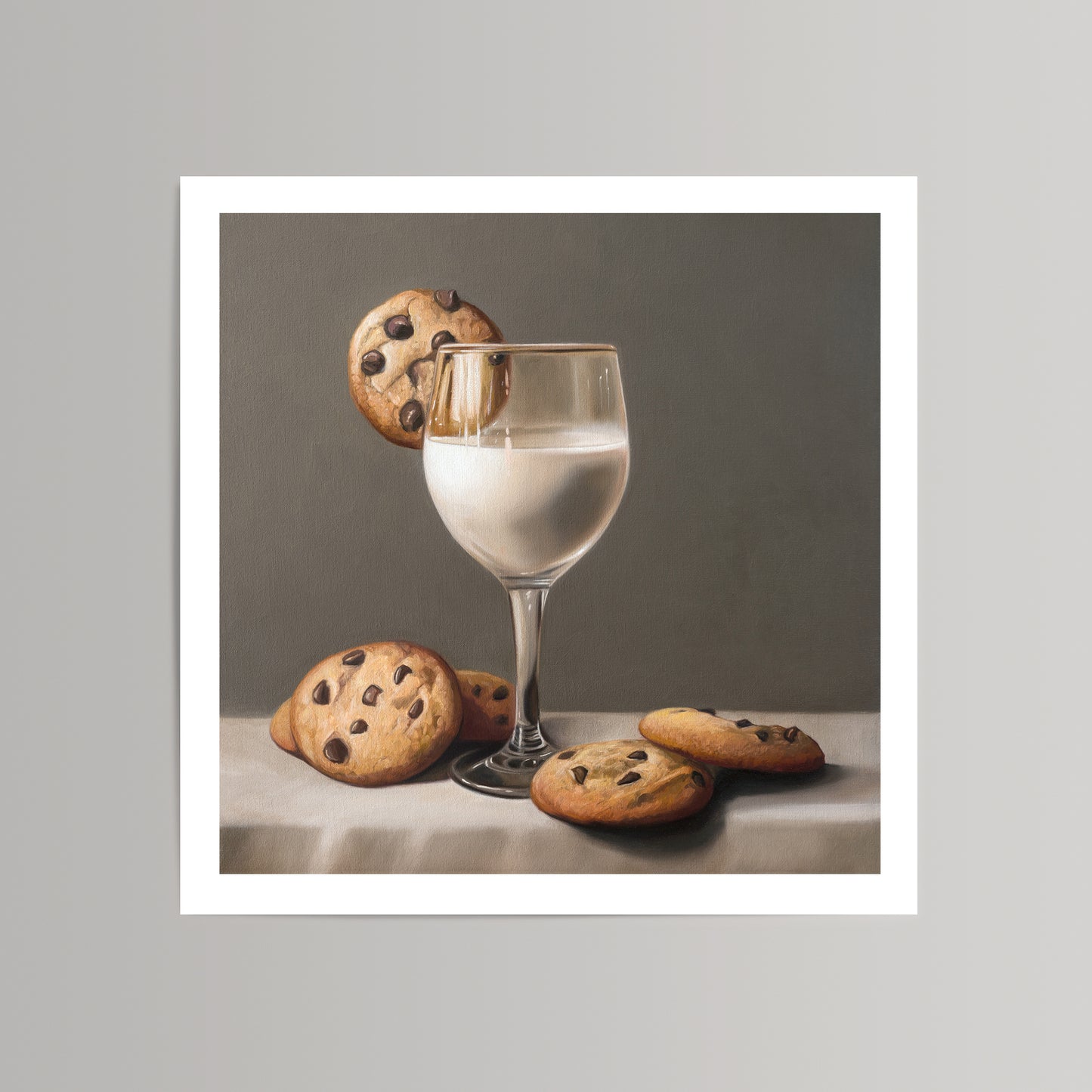Still life art print of a glass of milk with chocolate chip cookies on a white cloth.