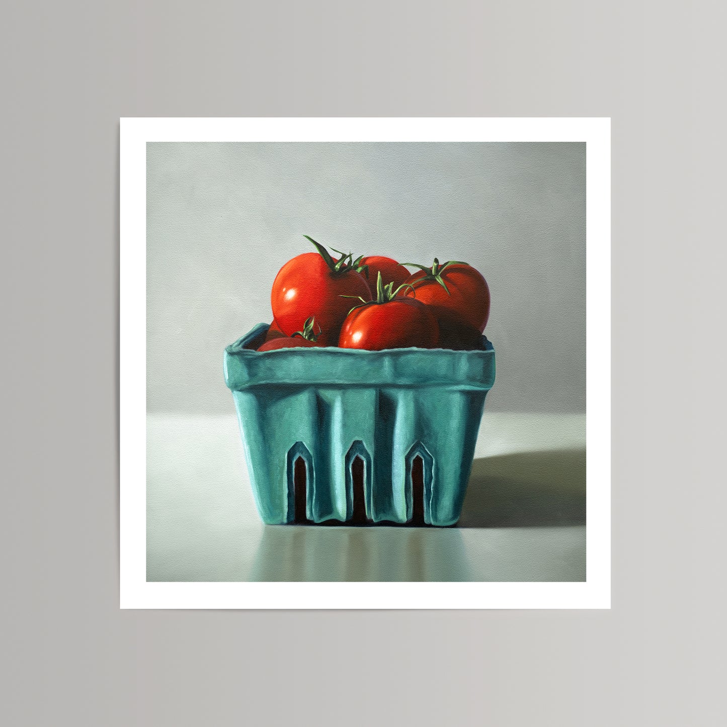 Vibrant fine art print of red tomatoes in a teal berry basket, on museum-grade cotton rag paper.