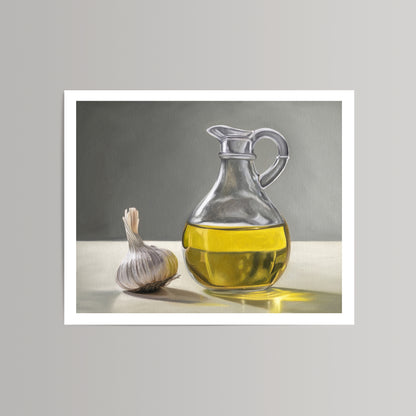 Still life print of a glass carafe filled with golden olive oil next to a head of garlic.