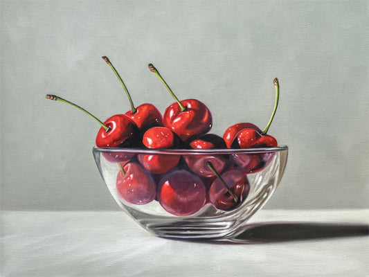 Glass Bowl of Cherries Fine Art Print by Lauren Pretorius: a clear glass bowl overflowing with bright red cherries.