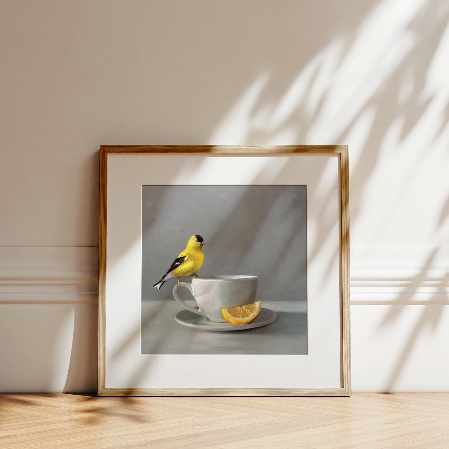 Goldfinch and Lemon Tea Fine Art Print by Lauren Pretorius: an American Goldfinch perched on a cup of lemon tea.is from a series of paintings that I am working on birds and beverages.