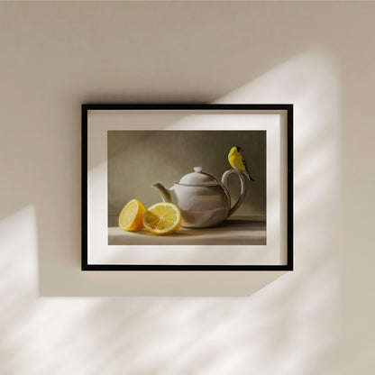 Goldfinch & Teapot Fine Art Print by Lauren Pretorius: a goldfinch perched on the handle of a teapot with two lemons on the left.