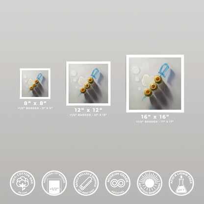 Three square art prints of green olives on a blue sword skewer, available in 8x8, 12x12, and 16x16 inches.