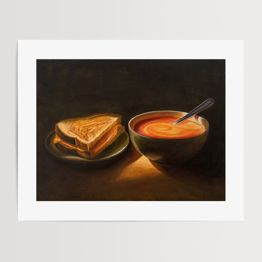 Grilled Cheese & Tomato Soup Fine Art Print by Lauren Pretorius: a bowl of tomato soup and a grilled cheese sandwich, with a spoon resting in the soup.