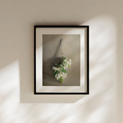 Hanging Apple Blossoms Fine Art Print by Lauren Pretorius: a branch of crabapple blossoms hanging adjacent to a warm grey surface.