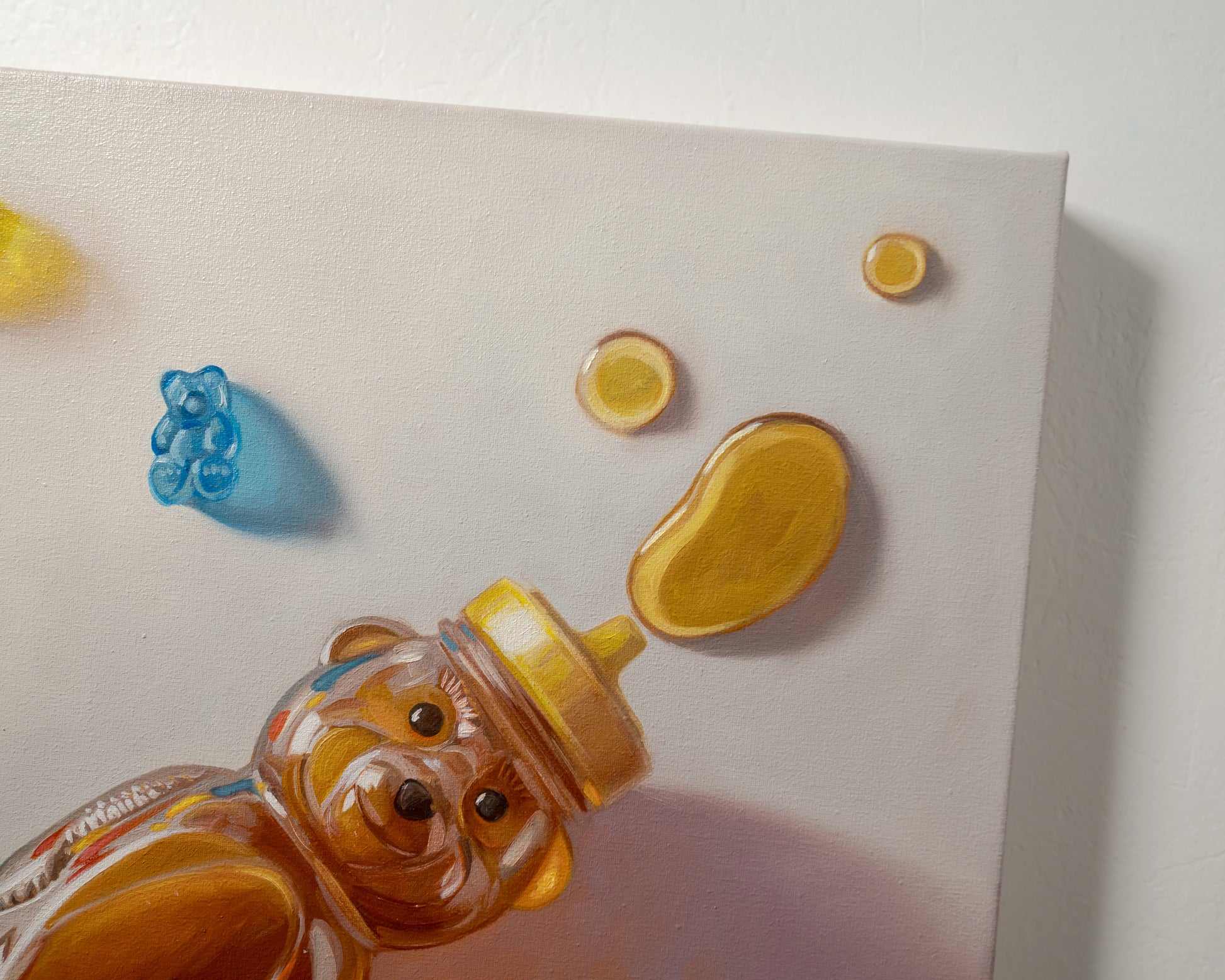Honey Bear & Gummy Bear Trio 12" x 12" Original Oil Painting by Lauren Pretorius: a honey bear bottle with gummy bear candies on a light background