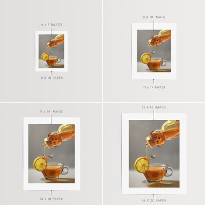 Honey, Bee, Lemon & Tea Fine Art Print by Lauren Pretorius: a honey bee observing a backlit tipped honey bear bottle drizzling golden honey down onto a lemon slice that rests on the lip of a glass cup of tea.