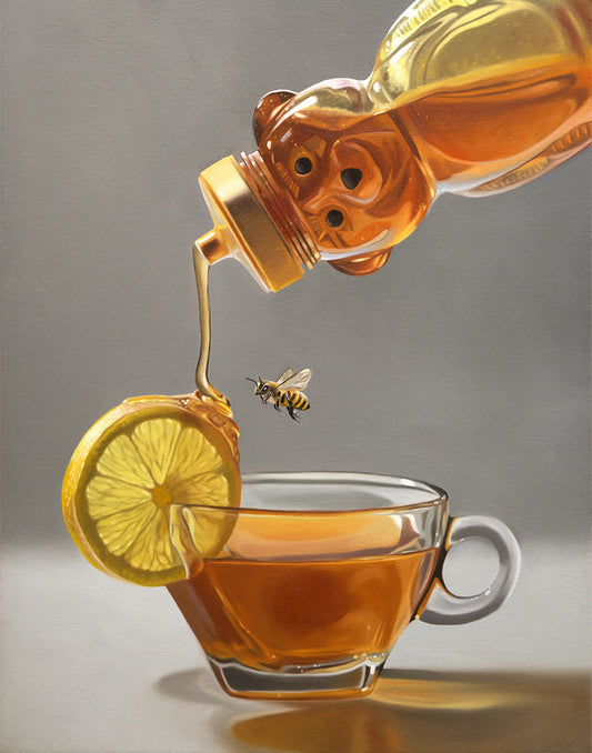 Vibrant fine art print of honey pouring from a bear bottle onto a lemon slice over a tea cup, with a bee.