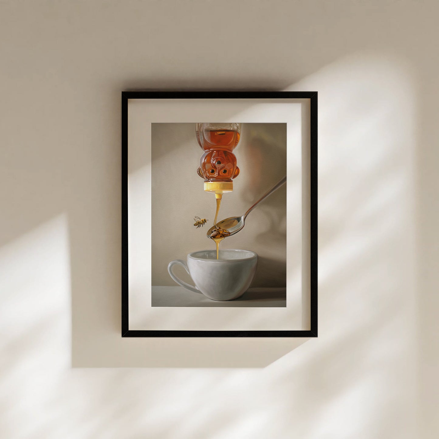 Honey, Bee, Spoon & Tea Fine Art Print by Lauren Pretorius: a classic honey bear bottle turned upside down whilst golden honey spills into a spoon and cup of tea below.