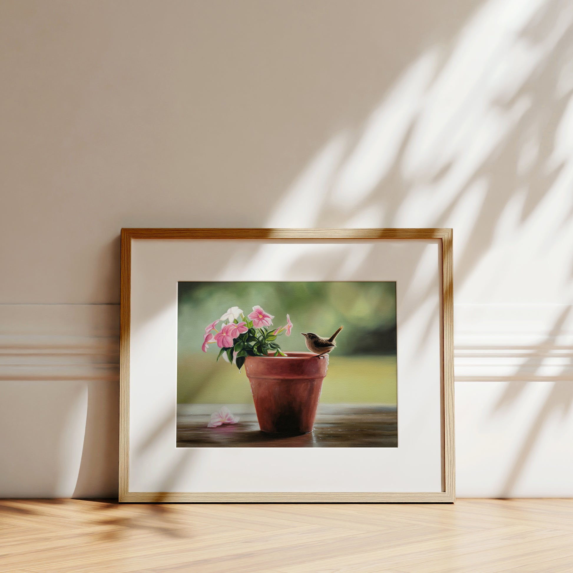 House Wren & Blossoms Fine Art Print by Lauren Pretorius: a house wren perched on the edge of a terracotta pot with pink blossoms.