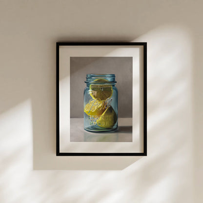 Jar of Lemons Fine Art Print by Lauren Pretorius: a vintage turquoise jar containing a trio of lemon halves.