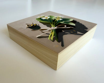 Cradled wood painting with a bouquet of flowers on a white background
