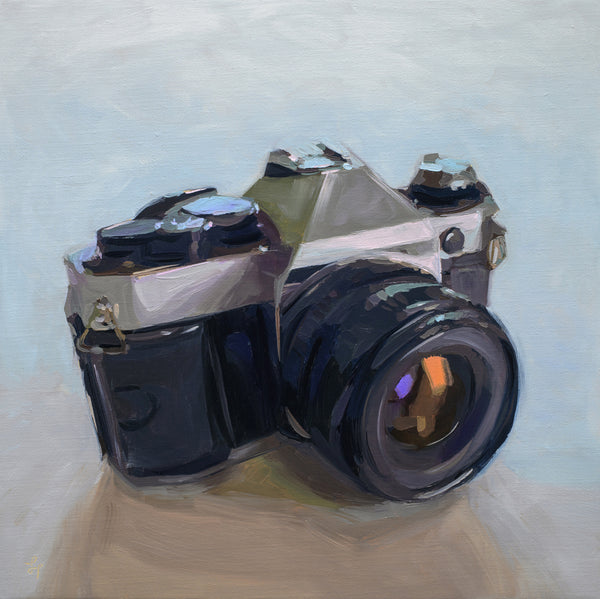 An oil painting of a vintage film camera with a black body and silver top, set against a light blue-gray background.