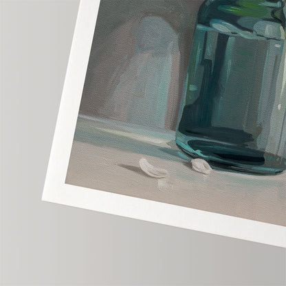 Fine art print of a teal glass jar with fallen apple blossoms on textured, museum-grade cotton rag paper with a white border.
