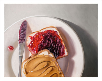 Fine art print of a peanut butter and jelly sandwich on a white plate with a butter knife, featuring a white border.