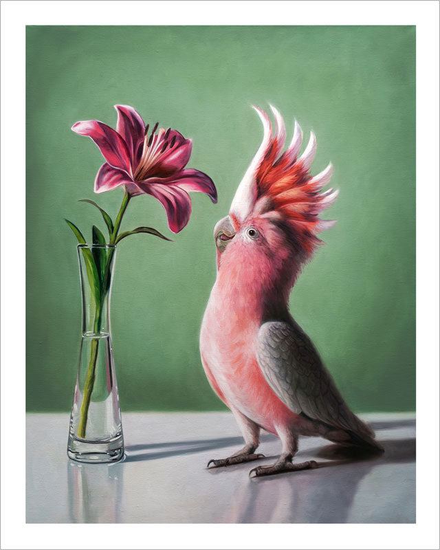 Fine art print of a pink cockatoo standing beside a pink lily in a glass vase against a soft green background.