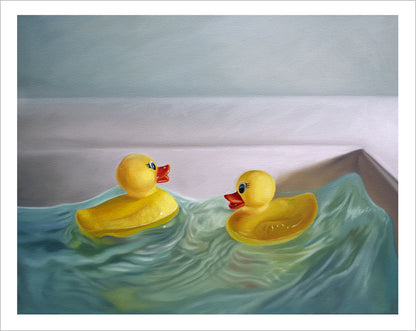 Fine art print of two yellow rubber duckies floating in rippling blue water inside a white bathtub.