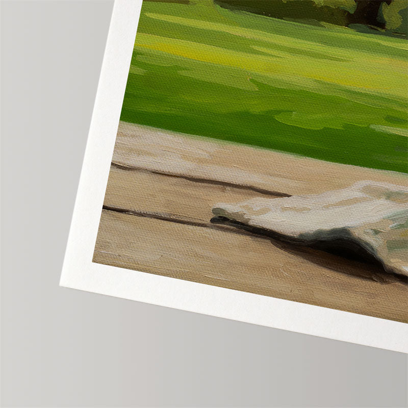 Fine art print on textured cotton rag paper with a white border showing a painted green lawn and wooden deck.