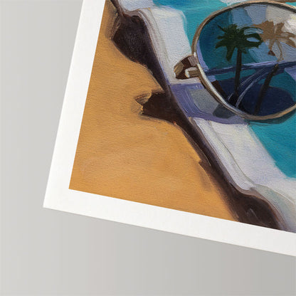 Fine art print of sunglasses reflecting palm trees on a beach towel, printed on textured cotton rag paper with a white border.