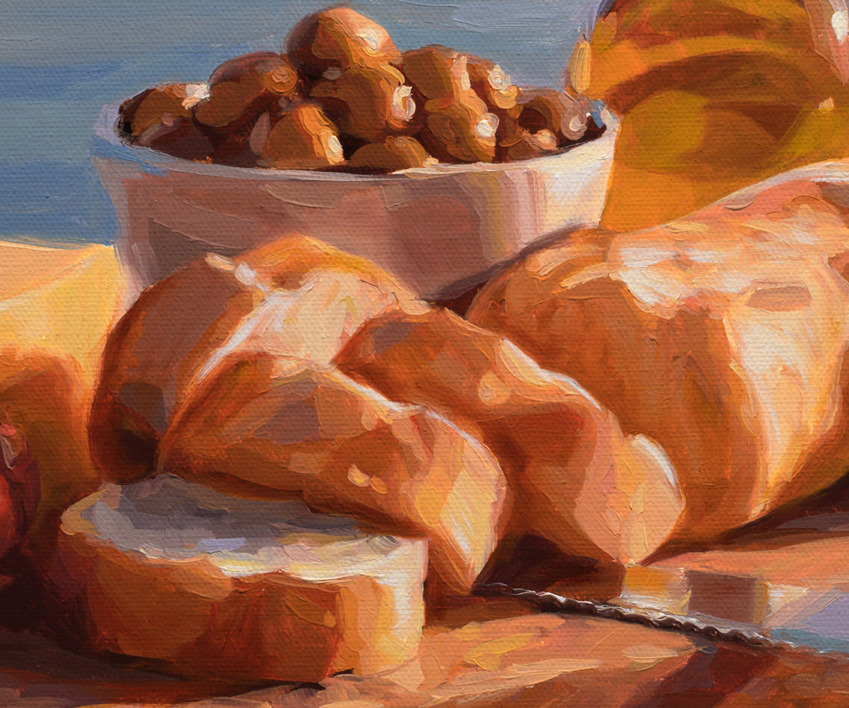Still life painting of sliced bread, a bowl of nuts, and a bottle of oil on a table, rendered in warm golden and orange tones with a blue background.