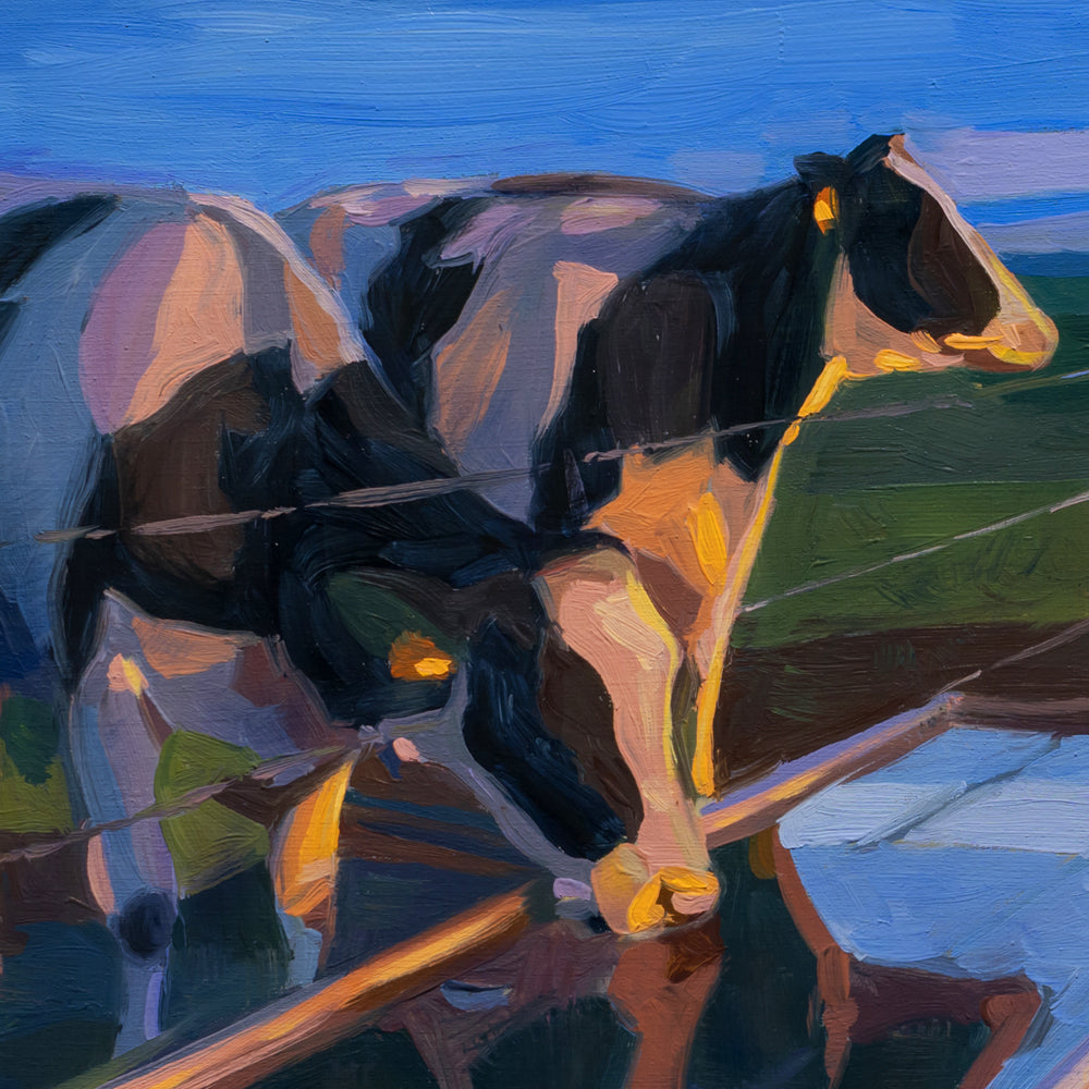 Colorful abstract painting of a cow in a field