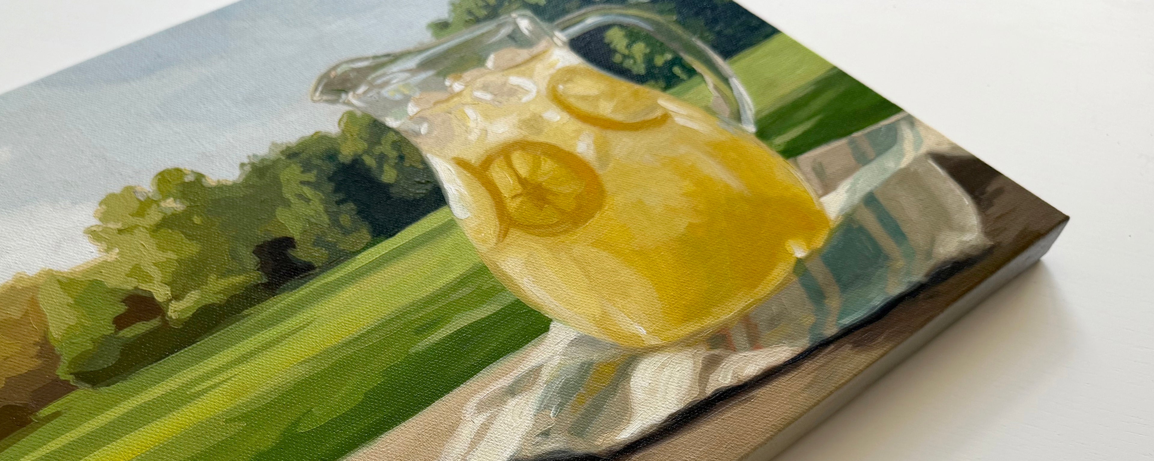 Painting of a pitcher of lemonade with a scenic background