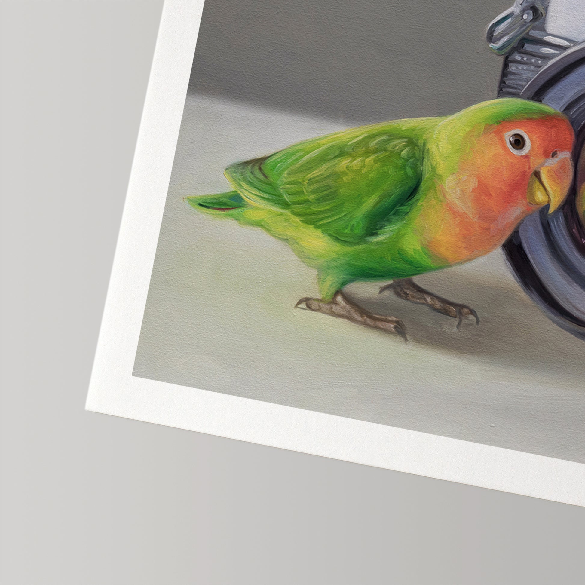 Vibrant lovebird with green wings and an orange face peeking into a camera lens on a fine art print.