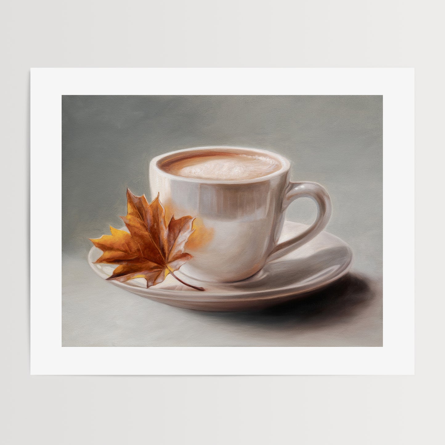 Maple Leaf & Latte Fine Art Print by Lauren Pretorius: a white coffee cup with a maple leaf on a gray background